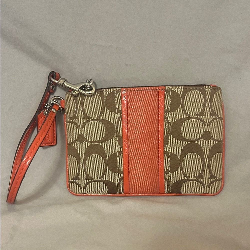 Coach Wristlet with Coral and Brown Design